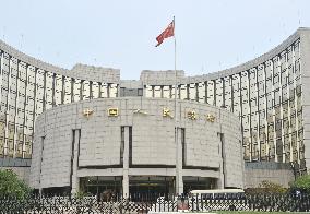 Chinese central bank devalues yuan
