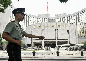 China sharply devalues yuan for second day