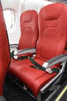 Red leather seats of Amakusa Airlines' new aircraft