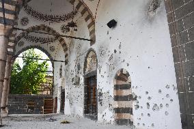 Bullet holes on mosque wall in Kurdish city in Turkey