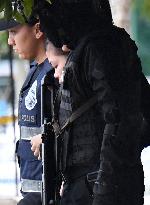 Malaysia charges 2 women with murder in Kim's death