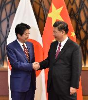 Japan's Abe, China's Xi