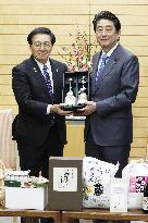 Japan PM Abe meets Ebetsu city mayor