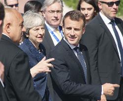 British PM May, French Pres. Macron