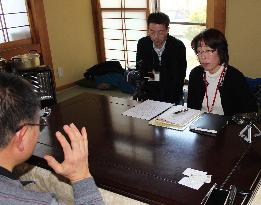 Tsunami-hit city library compiles victims' memoirs in English