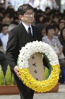 Nagasaki Mayor Taue pays floral tribute at Peace Park