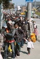 Queue for aid supplies