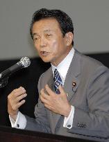 Aso proposes new scheme to train Japanese, Asians