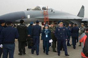 China unveils J-11 fighter