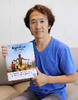 Japanese photojournalist releases book on Ugandan AIDS orphans