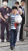 Japanese boy who survived alone in forest leaves hospital