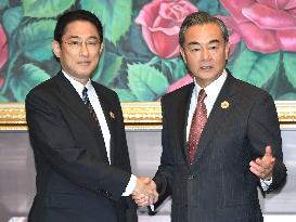 Japan, China foreign ministers meet in Laos