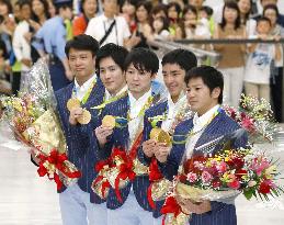 Olympics: Gold-winning Japanese gymnasts return home