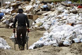 Clean-up work in flood-hit areas of western Japan
