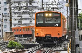 Osaka's iconic orange train makes final run