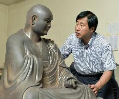 Replica of famous monk's wooden statute almost completed