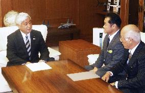 Defense minister vows efforts for early return of Futenma base