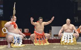 Former sumo yokozuna Chiyonofuji performs doyo