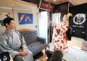 Geisha performance in local train car