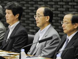 BOJ raises assessments for 8 regional economies