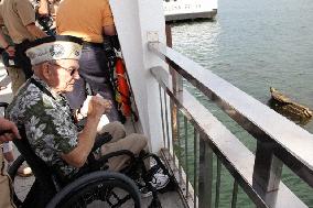 Pearl Harbor survivor back to battle site 70 years later