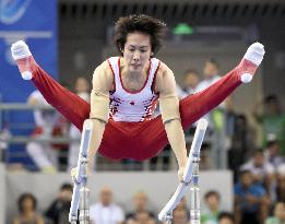 Japan's Kato wins parallel bars bronze at world championships