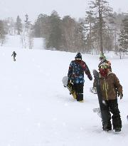 Snowboarders enjoy opening day of Ontake ski slope