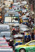 Vehicles stuck in heavy traffic in Bangkok