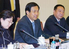 Japan trade minister begins day of meetings with Chinese officia