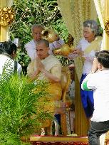 Sihamoni enthroned as Cambodia's new king