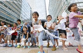 Cooling streets with water on hot summer day