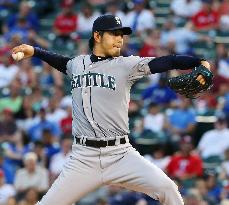 Iwakuma ties career-high with 14th victory