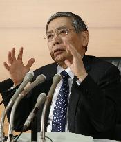 BOJ keeps policy steady, lifts assessment of exports, output