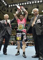 Japan's Koseki defends women's atom weight title