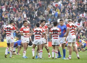 Japan keep quarterfinal dream alive with clinical win over Samoa