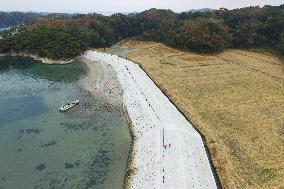 Massive levee system being built along northeastern Japan coast