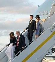 Trumps, Abes arrive in Palm Beach