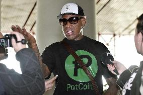 Rodman at Beijing airport