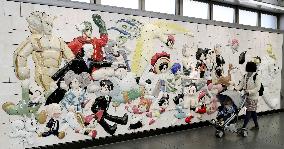 Relief with Osamu Tezuka's cartoon characters