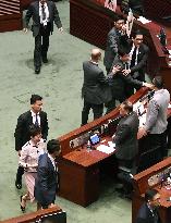 Hong Kong lawmakers protest