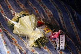 Flowers offered at Busan shooting accident site