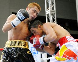 Sakata gets draw to remain WBA flyweight champion
