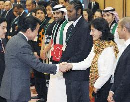 Young people from around the world greet PM Aso in Tokyo