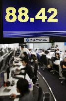 Dollar briefly tumbles to 88 yen in Tokyo