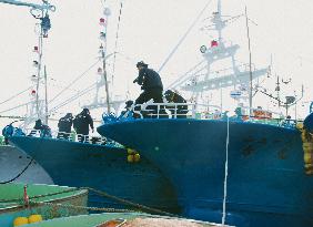 Coast Guard inspects boats bearing bullet holes