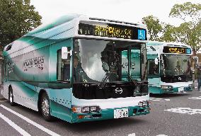 Toyota unveils hydrogen-powered fuel cell hybrid bus before expo