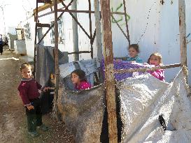 Syrian children playing at refugee camp in Jordan