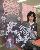 Sapporo apparel firm promotes items adopting Ainu designs