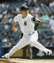 Baseball: Tanaka earns 13th win as Yankees defeat Blue Jays