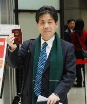 Chinese activist leaves Japan after 92-day protest at Narita airp